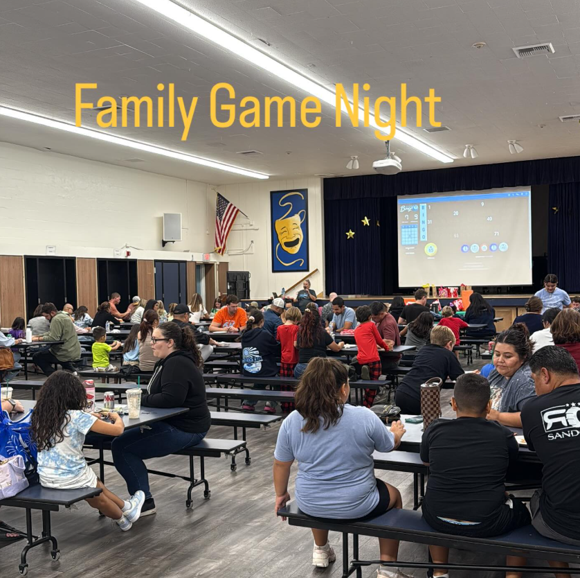 McPherson families gathered in the multipurpose room for Family Game Night